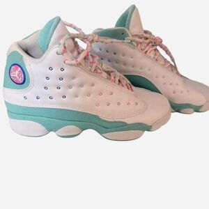 White and Teal Sneakers with Pink Accents